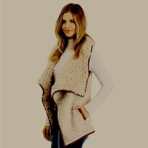 New Fur Long vest with faux leather applications ( size M)